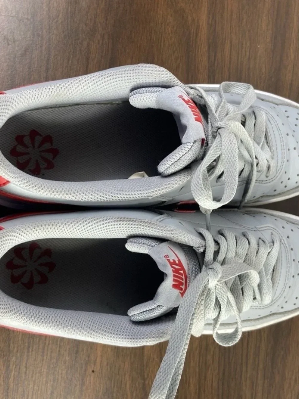 Nike Low-Top Sneakers in Light Gray with Red Swoosh